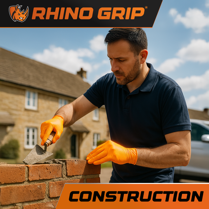Tradesperson wearing Rhino Grip orange nitrile gloves on-site – durable, textured disposable gloves for electricians, plumbers, builders, and decorators
